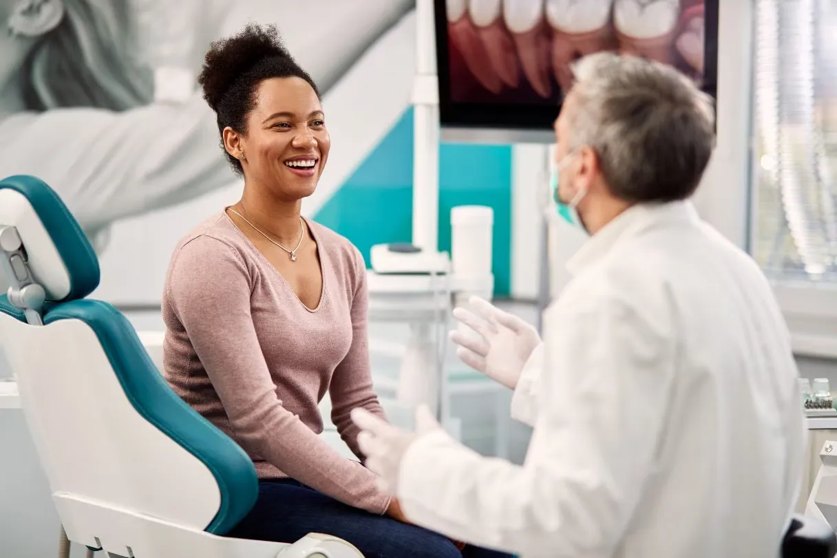 Patient consulting with dentist before sedation appointment