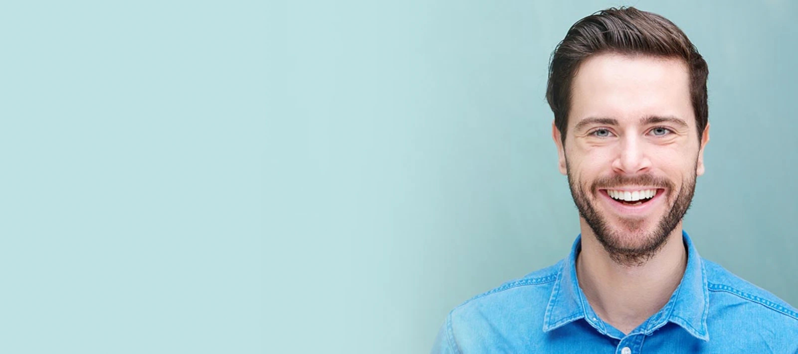 A confident patient smiling after personalized dental care