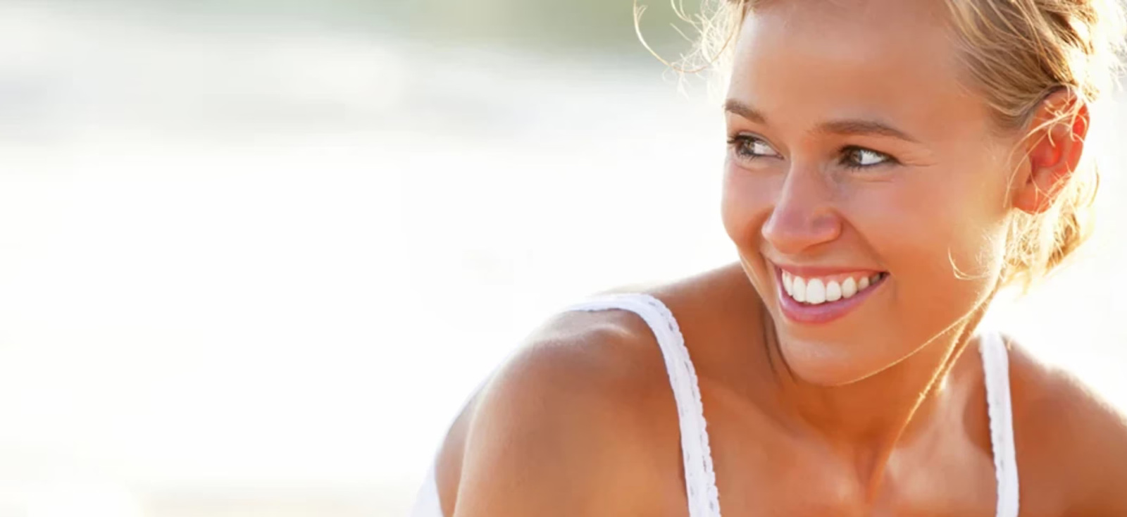 A confident patient smiling after personalized dental care